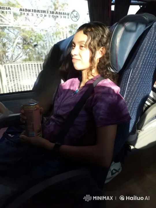 Young Woman Surprised by Purple Slime on Bus – AI Generated Video | Hailuo AI