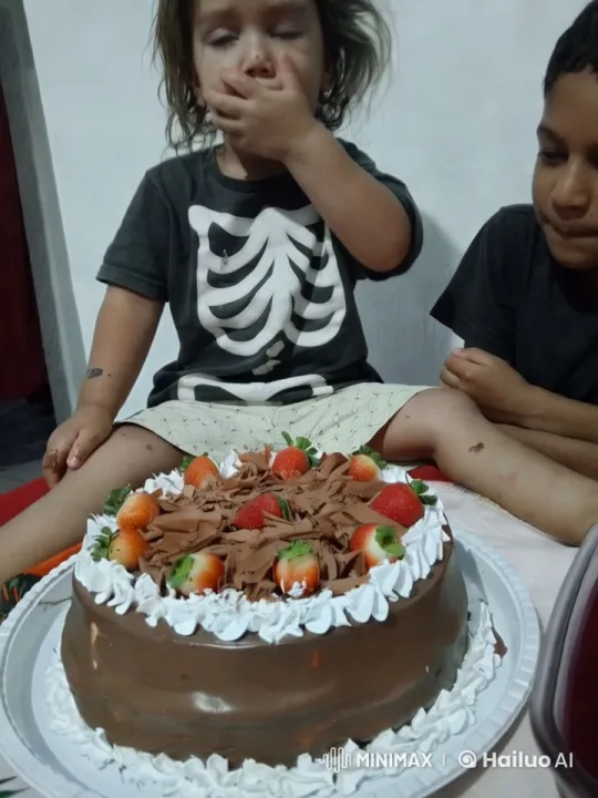 Aesthetic Close-up of Child and Decorated Cake – AI Generated Video | Hailuo AI