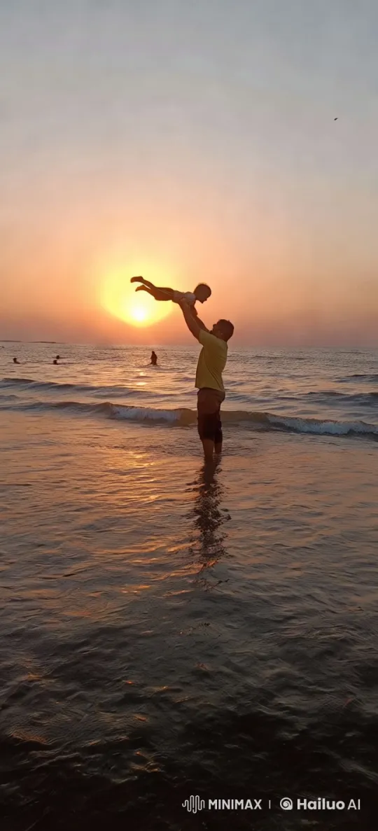 Sunset Bond: Father and Child on Tranquil Beach – AI Generated Video | Hailuo AI