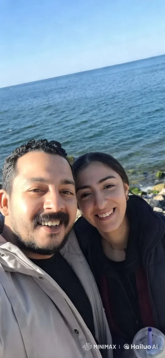Seaside Romance: Couple by the Calm Blue Sea – AI Generated Video | Hailuo AI