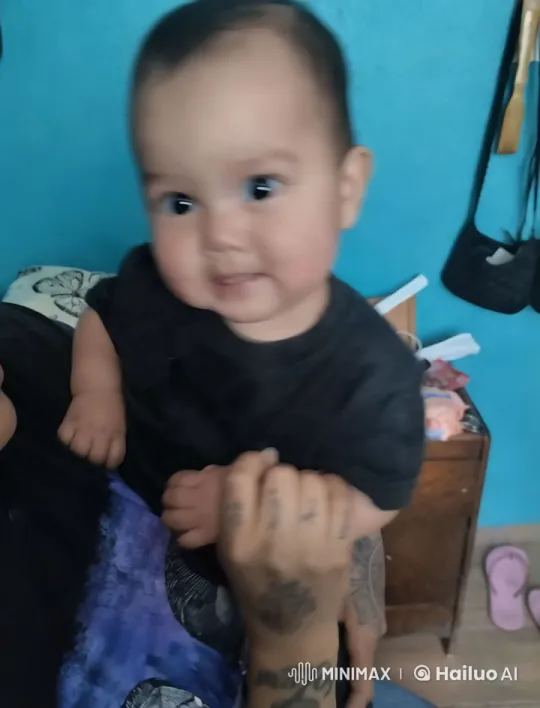 Child Dancing Playfully on Lap in Colorful Room – AI Generated Video | Hailuo AI