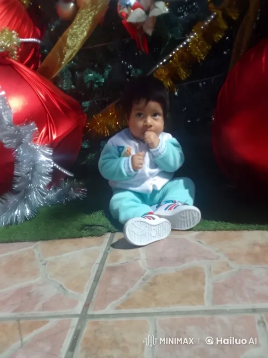 Baby in Cozy Outfit Plays Amidst Festive Decor – AI Generated Video | Hailuo AI