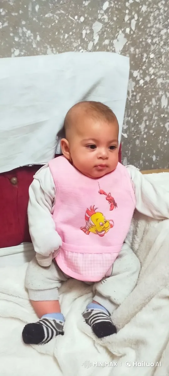 Baby in Cozy Outfit on Textured Background – AI Generated Video | Hailuo AI