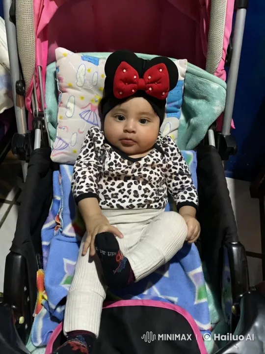 Child Dancing in Stroller with Colorful Outfit – AI Generated Video | Hailuo AI