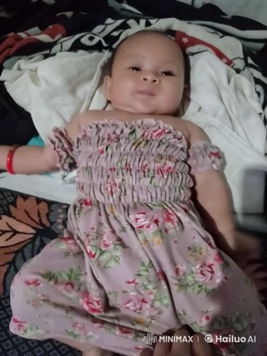Baby Dancing in Floral Dress with Playful Punches – AI Generated Video | Hailuo AI