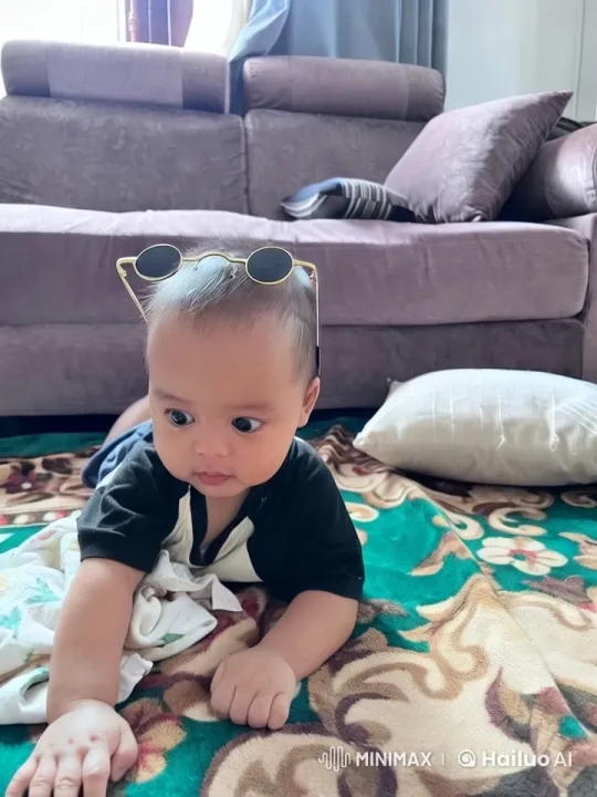 Child Enacts Playful Kung Fu Dance on Vibrant Carpet – AI Generated Video | Hailuo AI