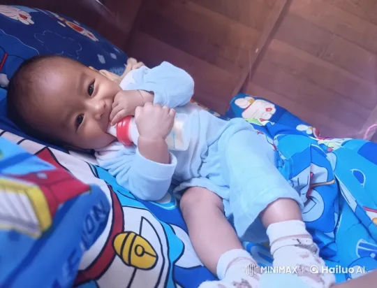 Child's Energetic Kung Fu Dance on Cartoon-Themed Bed – AI Generated Video | Hailuo AI