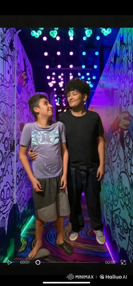 Boys Share Intimate Kiss in Colorful Graffiti Corridor – AI Generated Video | Hailuo AI