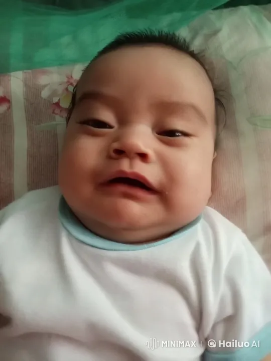 Baby Dancing Joyfully on Bed with Calm Music – AI Generated Video | Hailuo AI