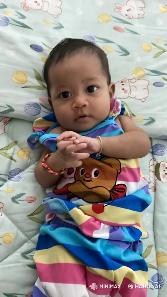 Baby Dancing Joyfully on Colorful Blanket – AI Generated Video | Hailuo AI