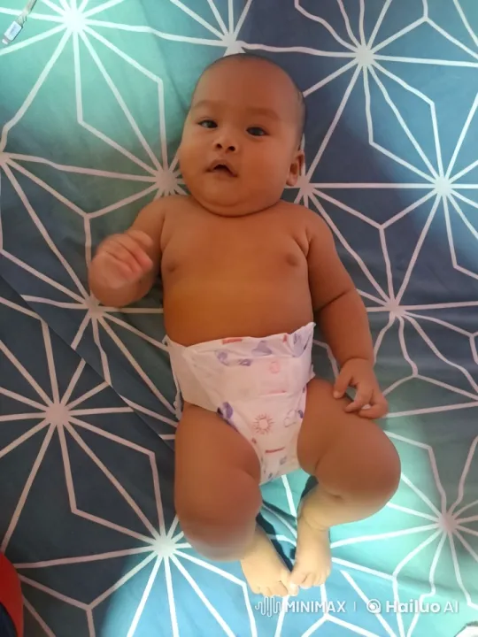 Baby Mimics Kung Fu Moves on Patterned Mat – AI Generated Video | Hailuo AI
