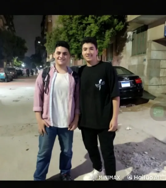 Two Men Kiss on a Dimly Lit Street – AI Generated Video | Hailuo AI