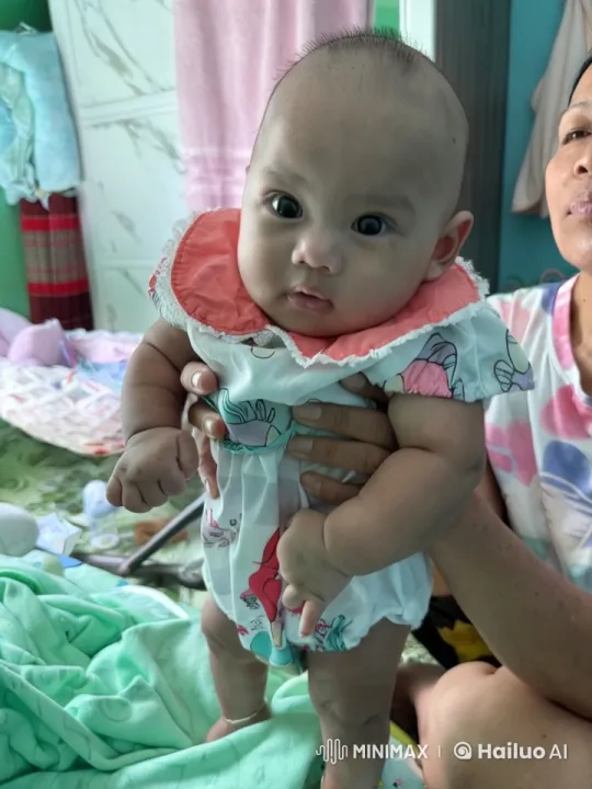 Baby Dancing Joyfully in Cozy Room with Adult Support – AI Generated Video | Hailuo AI