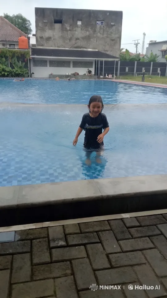 Child Jumping into Pool Captured in High Aesthetic Video – AI Generated Video | Hailuo AI