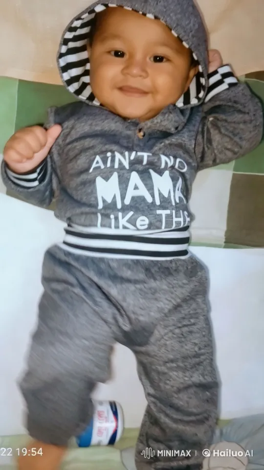 Baby in 'Ain't No Mama' Hoodie on Cozy Bed – AI Generated Video | Hailuo AI