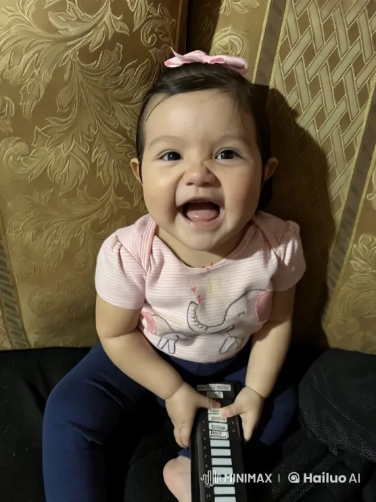 Baby Girl Joyfully Dancing with Toy – AI Generated Video | Hailuo AI
