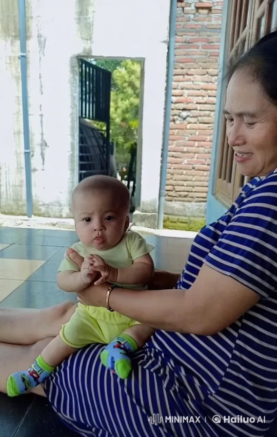 Baby Mimics Kungfu on Grandmother's Lap – AI Generated Video | Hailuo AI