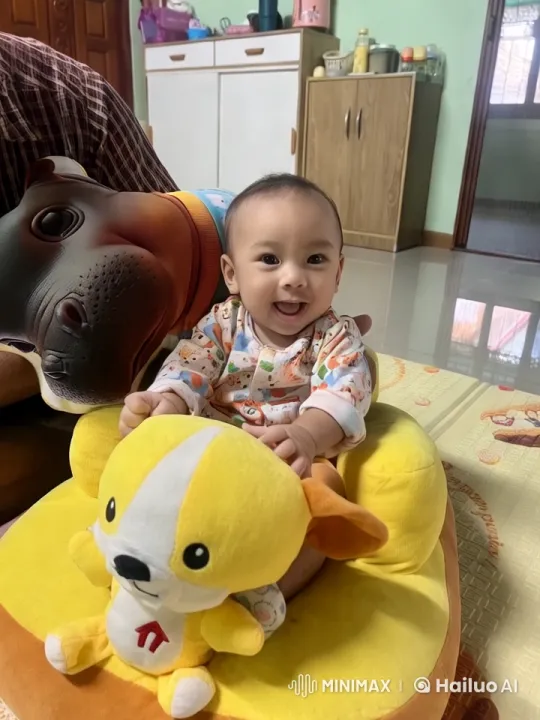 Baby's Joyful Playtime with Toy in Cozy Living Room – AI Generated Video | Hailuo AI