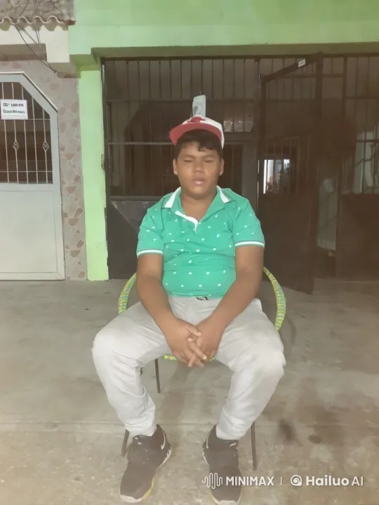 Boy Dancing Energetically in Front of Building – AI Generated Video | Hailuo AI