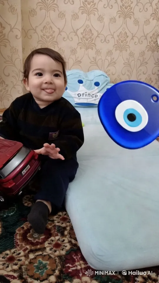 Child Playing with Toy Car in Cozy Room – AI Generated Video | Hailuo AI