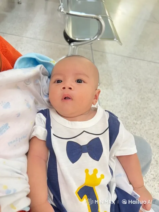 Baby Mimics Kung Fu in Modern Waiting Area – AI Generated Video | Hailuo AI
