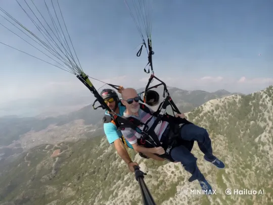 Aerial Adventure: Paragliding Over Majestic Mountains – AI Generated Video | Hailuo AI