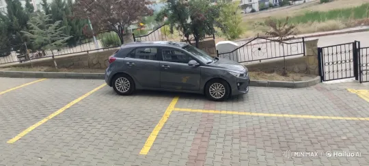 Sleek Car Parked Poorly Amidst Greenery and Buildings – AI Generated Video | Hailuo AI