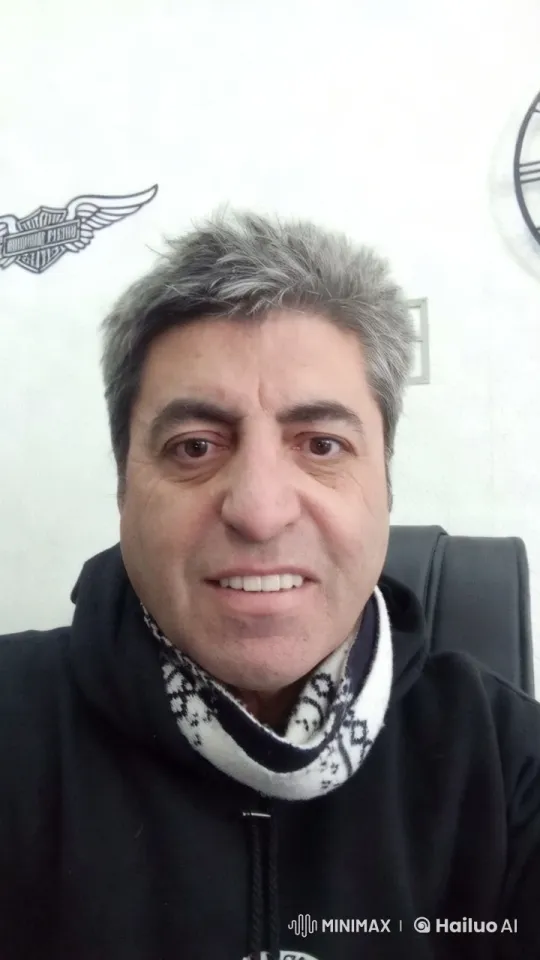 Gray-haired Man in Minimalist Room with Harley Davidson Logo – AI Generated Video | Hailuo AI