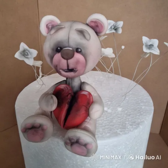 Melancholic Bear Holds Broken Heart Amidst Flowers – AI Generated Video | Hailuo AI
