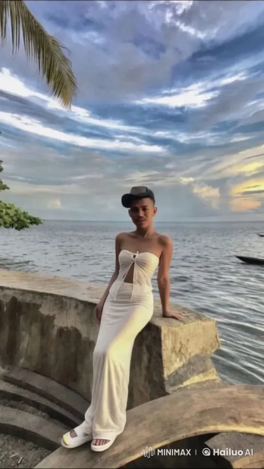 Elegant Woman Practicing Martial Arts by the Ocean at Sunset – AI Generated Video | Hailuo AI