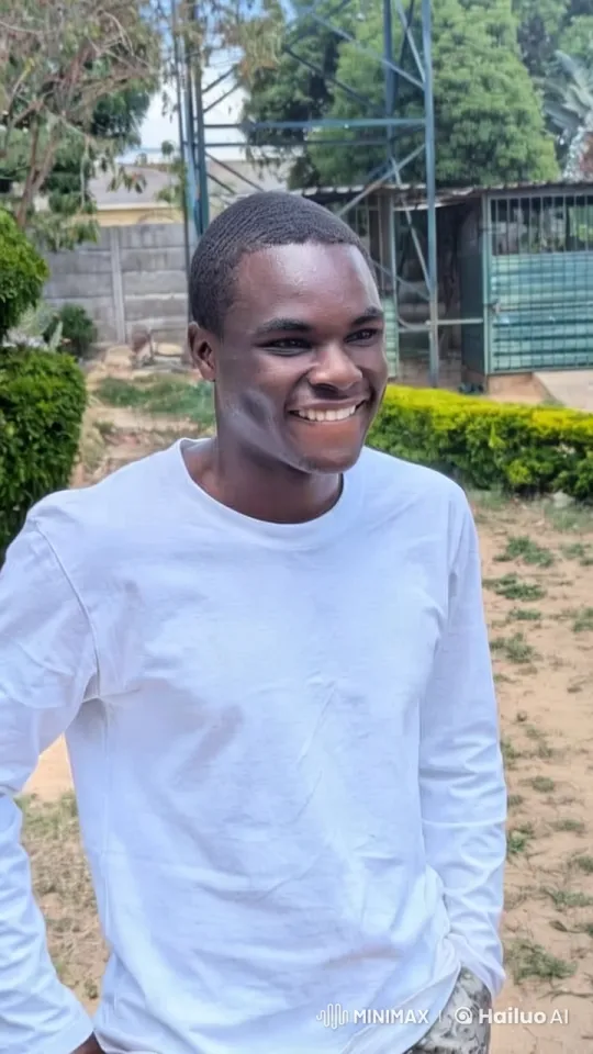 Young Man in Nature, Smiling Brightly – AI Generated Video | Hailuo AI