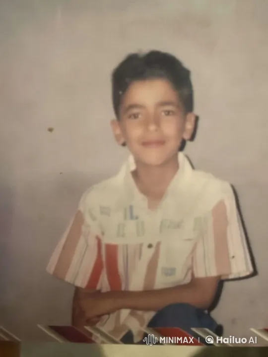 Boy in Striped Shirt: A Study in Simplicity and Serenity – AI Generated Video | Hailuo AI