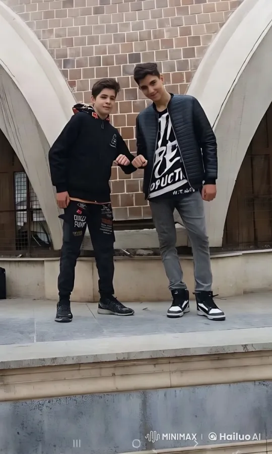 Young Friends Embrace on Urban Platform – AI Generated Video | Hailuo AI
