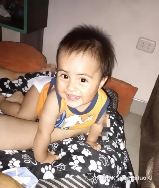Baby Dancing Joyfully on Patterned Blanket – AI Generated Video | Hailuo AI
