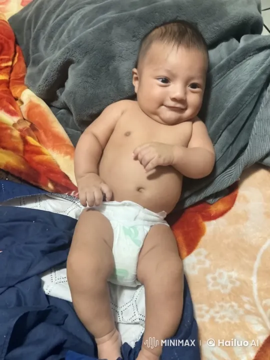 Baby Dancing Joyfully in Colorful Bedding – AI Generated Video | Hailuo AI