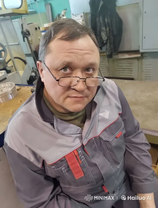 Workshop Scene with Man in Uniform – AI Generated Video | Hailuo AI