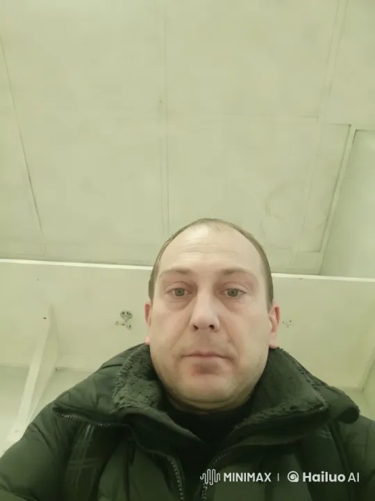 Contemplative Man Admires Winter Sunset Over River – AI Generated Video | Hailuo AI