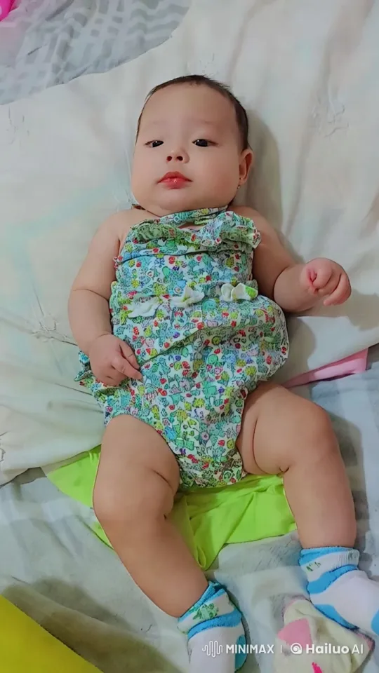 Baby's Joyful Dance in Colorful Floral Outfit – AI Generated Video | Hailuo AI