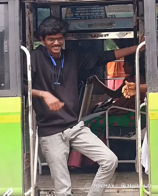 Young Man at Bus Entrance with Colorful Aesthetic – AI Generated Video | Hailuo AI