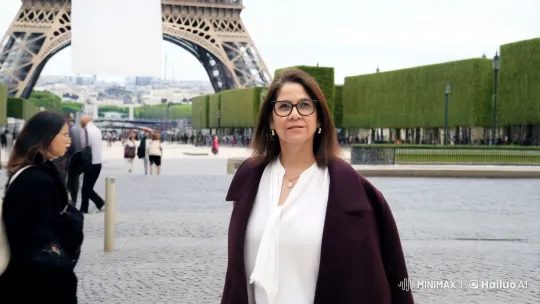 Woman Strolls Gracefully by the Eiffel Tower in Paris – AI Generated Video | Hailuo AI