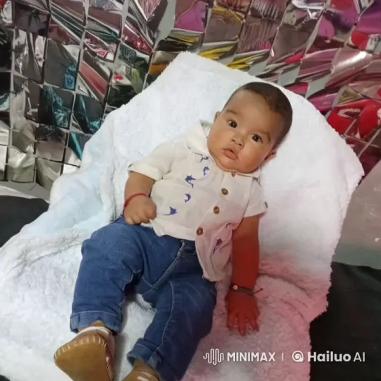 Baby Dancing Joyfully in Reflective Backdrop – AI Generated Video | Hailuo AI