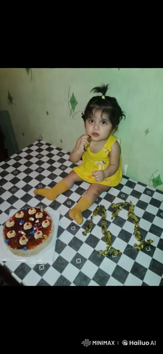 Little Girl on Checkered Table with Candy – AI Generated Video | Hailuo AI