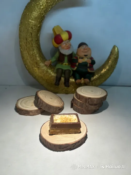 Artful Display: Dessert and Figurines on Wooden Coasters – AI Generated Video | Hailuo AI