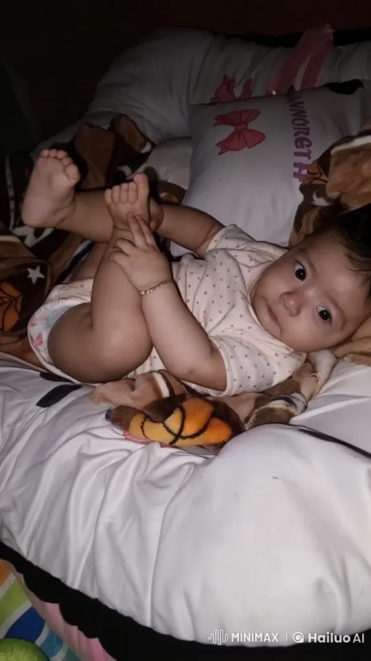 Baby Joyfully Dancing on Cushions – AI Generated Video | Hailuo AI