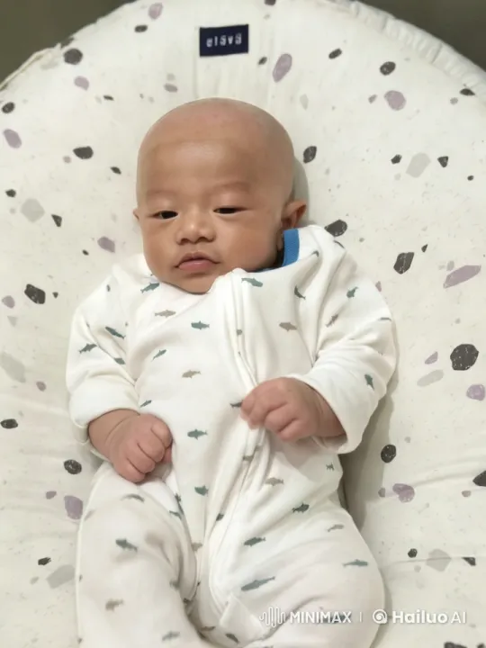 Baby Dancing Joyfully on Cushion in Serene Setting – AI Generated Video | Hailuo AI