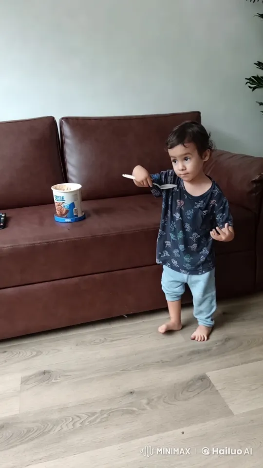 Child Performs Playful Kung Fu Dance in Minimalist Setting – AI Generated Video | Hailuo AI