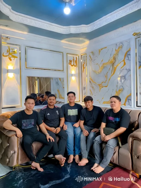 Five Men Relax on Plush Sofa in Elegant Room – AI Generated Video | Hailuo AI