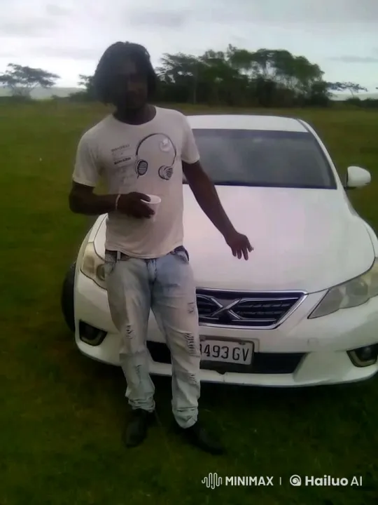 Man in White Outfit with Car Amidst Nature – AI Generated Video | Hailuo AI