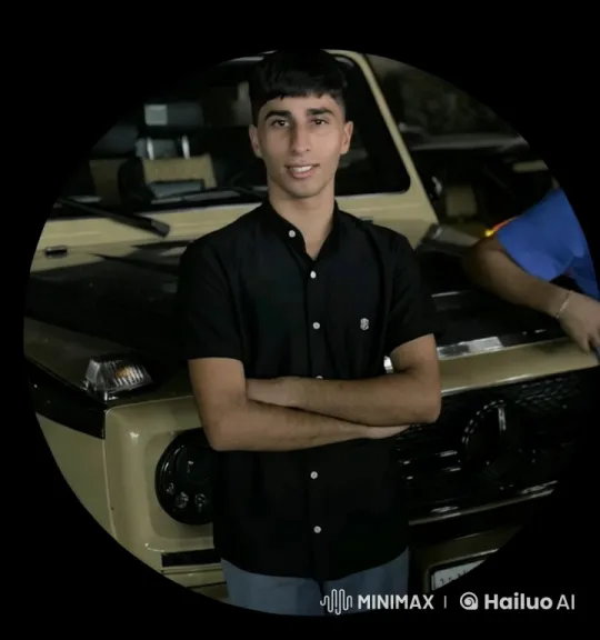 Young Man Reflects by Luxurious Car with Dramatic Lighting – AI Generated Video | Hailuo AI