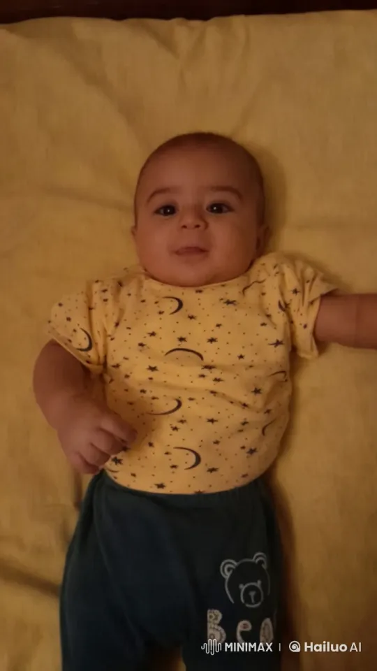 Baby Dancing Joyfully on Yellow Blanket – AI Generated Video | Hailuo AI
